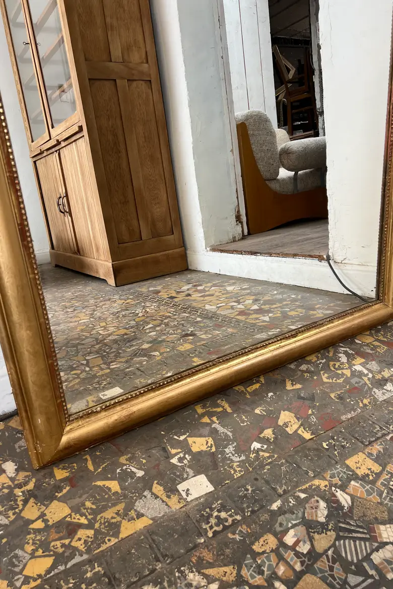 Ancien miroir doré avec noeud