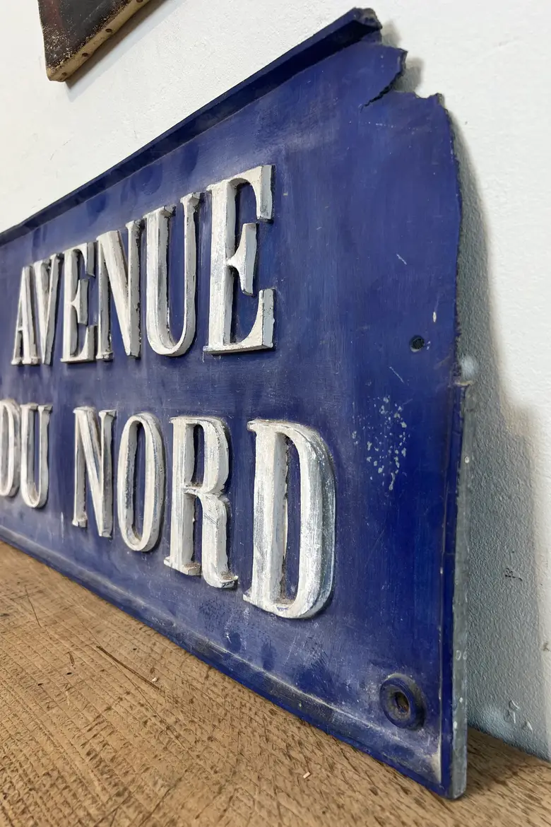 Ancienne plaque de rue en fonte