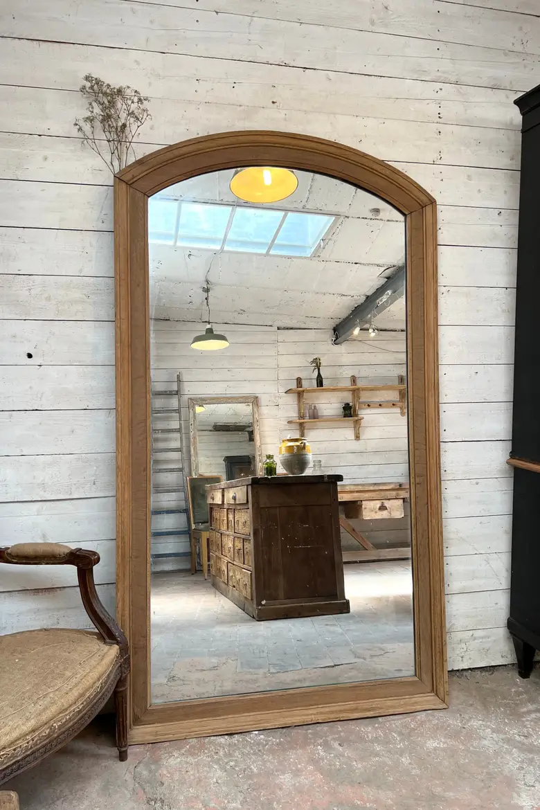 Grand miroir en chêne Début XXème