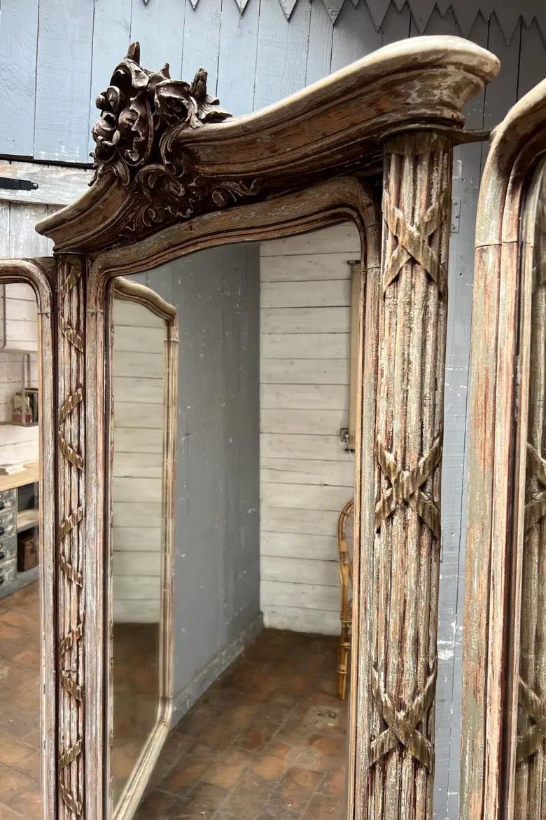 Imposant miroir triptyque de magasin