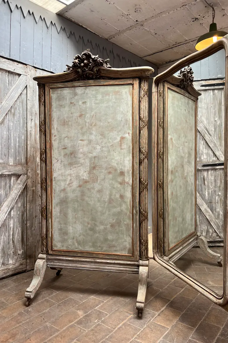Imposant miroir triptyque de magasin