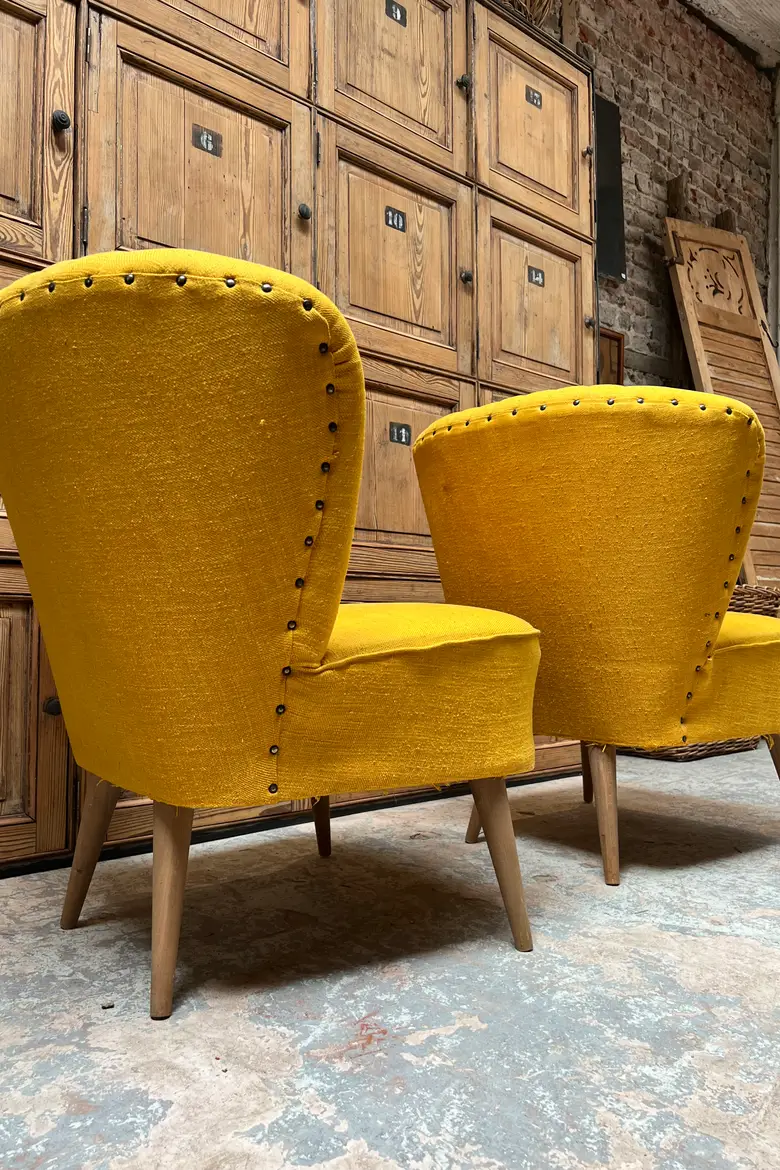 Paire de fauteuils cocktails jaunes 1950