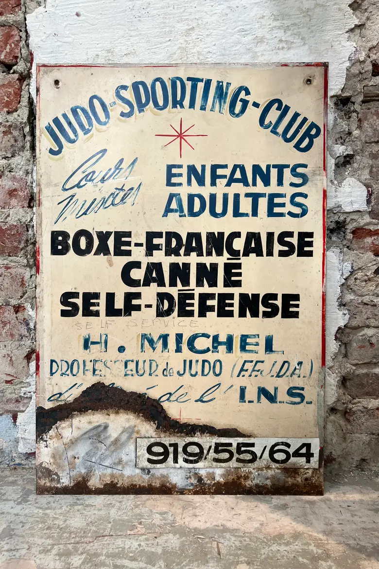 Pancarte publicitaire en tôle - années 1960 — Pancarte publicitaire en tôle - années 1960