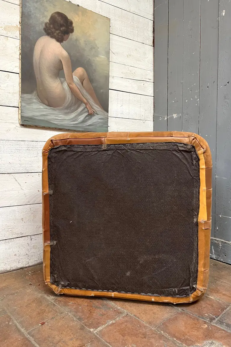 Pouf en cuir vintage 1980